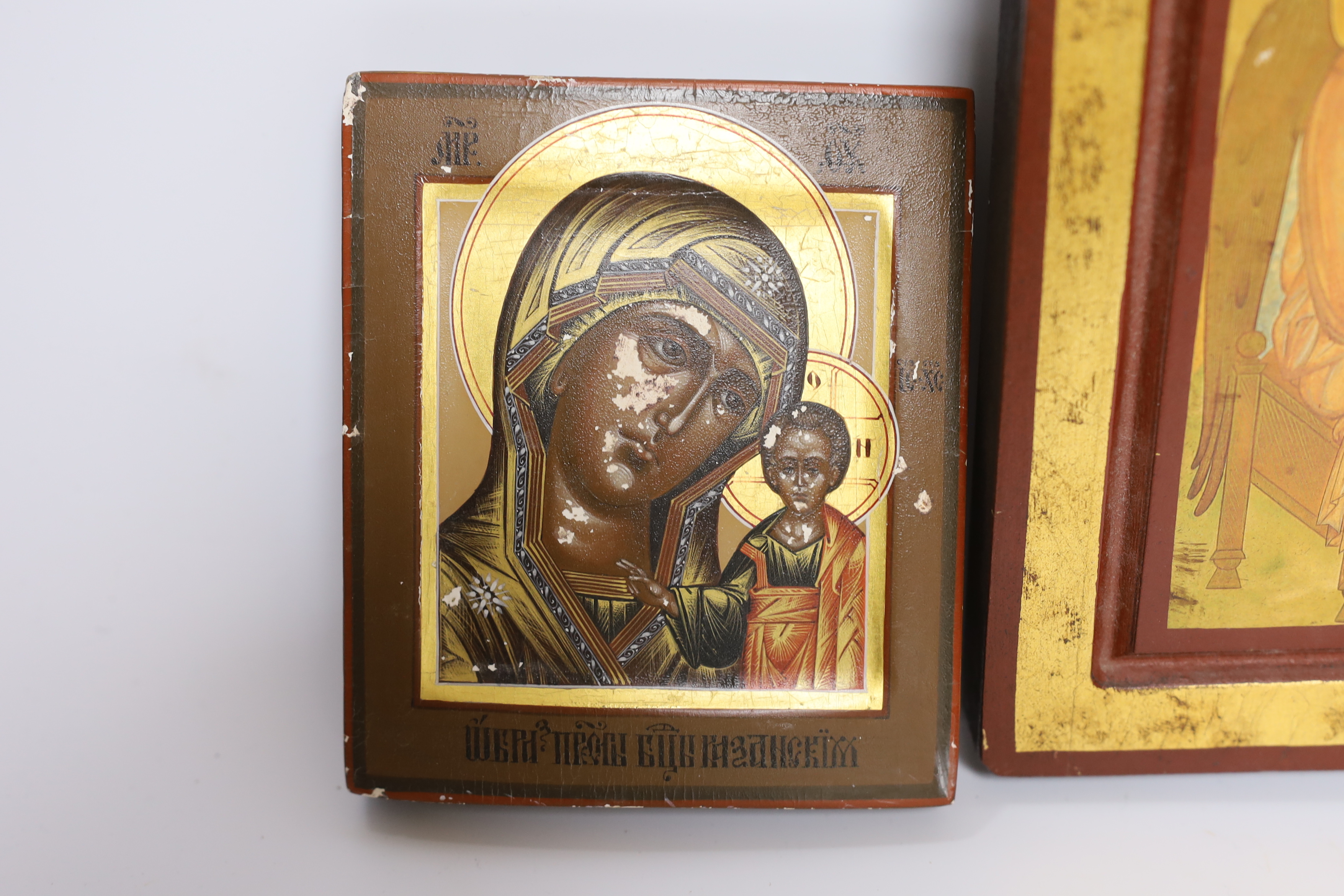 Two modern Russian Icons; the Virgin and child and three angels, larger 22 x 21cm